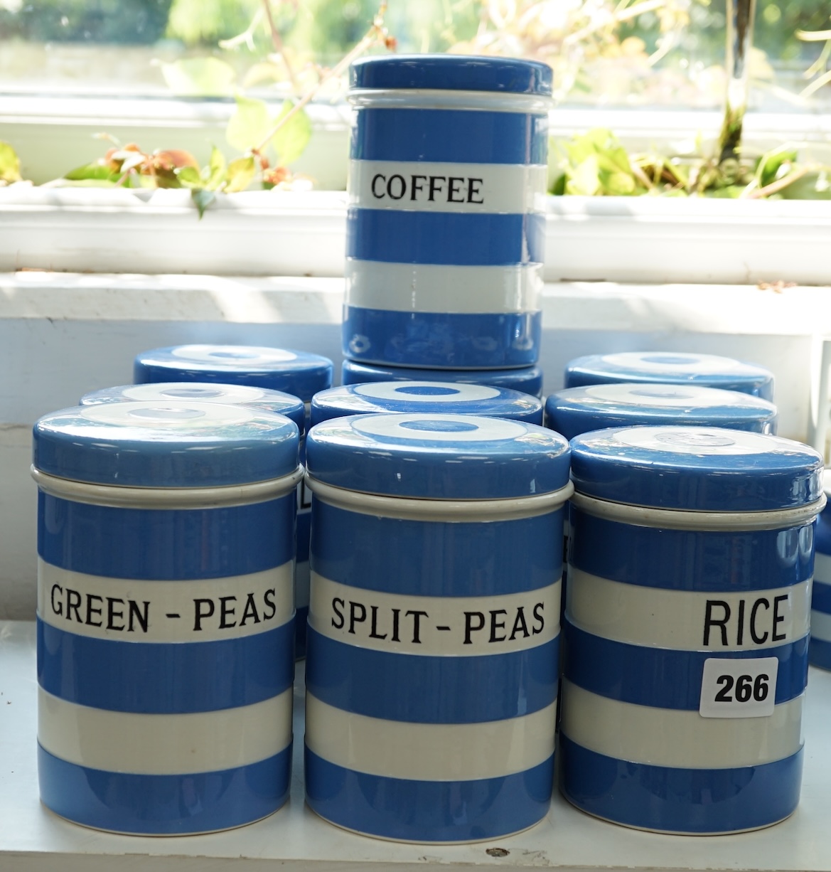 T.G.Green Cornish Kitchenware, ten 14cm lidded storage jars to include Green-Peas, Split- Peas, Cornflour, Ground Rice and Barley, mainly Black Shield marks. Condition - poor, fair and good